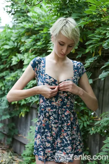Slim Short-Haired Blonde Strips Out of Her Dress Outdoors