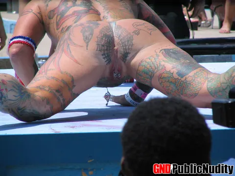 Busty Brunette Strips and Spreads on Public Stage – photo 6 of 12