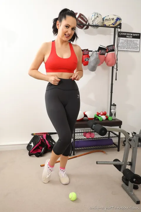 European Brunette Reveals Her Big Tits on a Gym Bench – photo 5 of 16