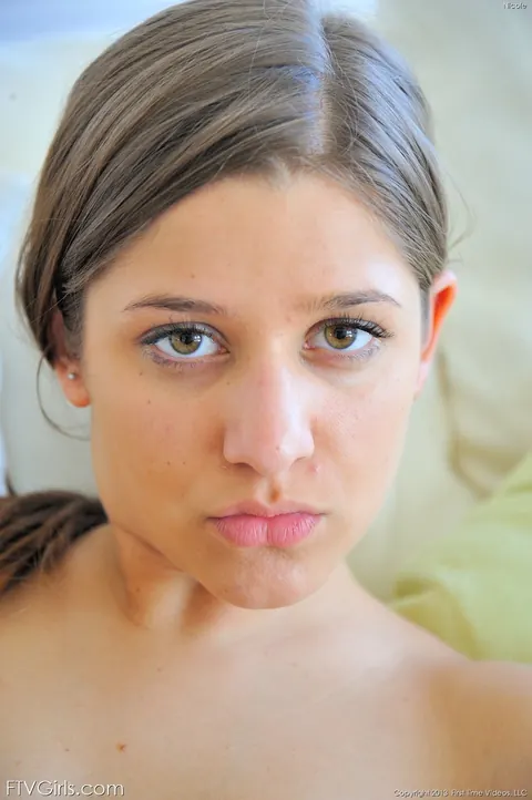 Teddi Rae: Brunette in a Bikini Strips and Spreads Her Legs Showing Her Feet on the Bed – photo 16 of 20