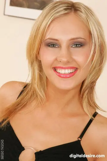 Blonde with Natural Tits and Tattoo Poses Nude for Glamour Shots