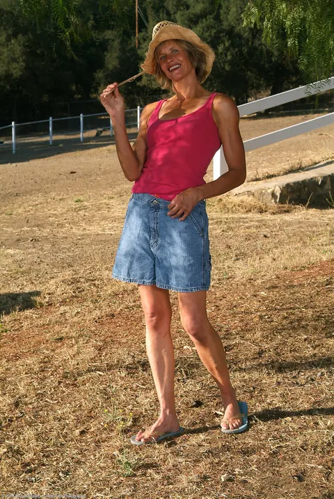 Skinny Short-Haired MILF Strips Out of Her Denim Skirt Outdoors – photo 1 of 21