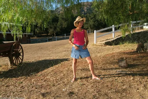 Skinny Short-Haired MILF Strips Out of Her Denim Skirt Outdoors – photo 4 of 21