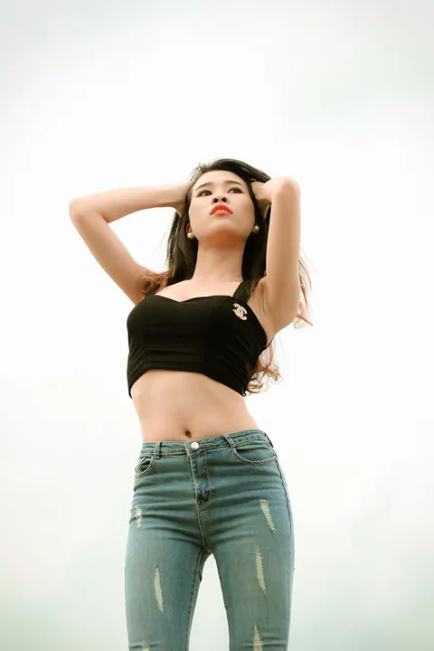 Petite Asian Brunette Poses in Jeans Outdoors – photo 9 of 21