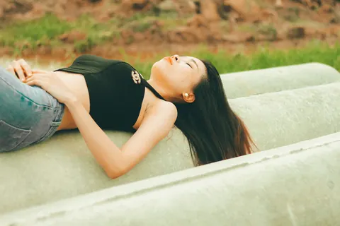 Petite Asian Brunette Poses in Jeans Outdoors – photo 15 of 21