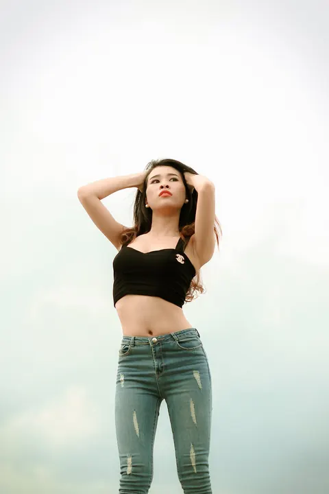 Petite Asian Brunette Poses in Jeans Outdoors – photo 10 of 21