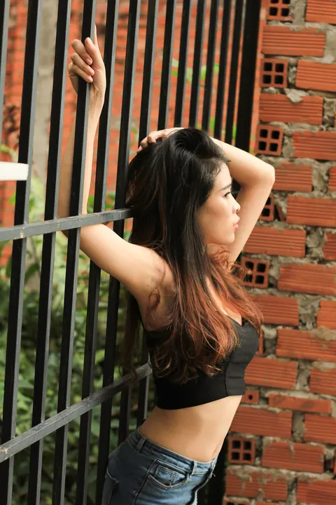 Petite Asian Brunette Poses in Jeans Outdoors – photo 5 of 21
