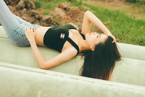 Petite Asian Brunette Poses in Jeans Outdoors – photo 16 of 21