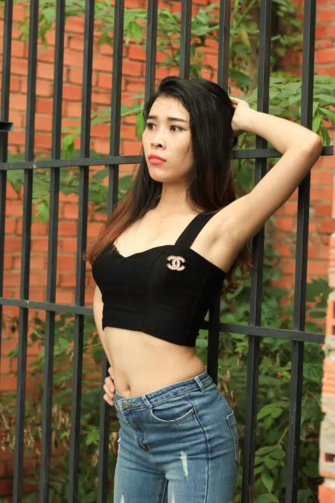 Petite Asian Brunette Poses in Jeans Outdoors – photo 6 of 21