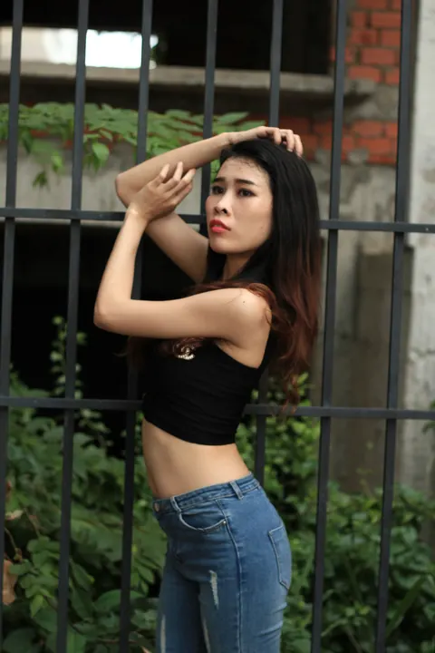 Petite Asian Brunette Poses in Jeans Outdoors – photo 3 of 21