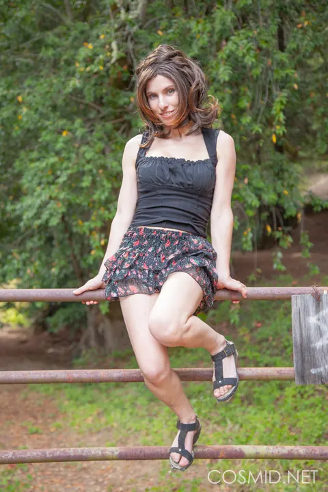 Brunette with Big Tits Strips Out of Her Top Outdoors – photo 10 of 16