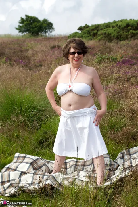 BBW MILF Doctor Strips Out of Her Bikini on a Blanket in the Forest – photo 5 of 16