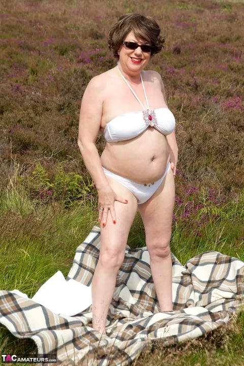 BBW MILF Doctor Strips Out of Her Bikini on a Blanket in the Forest – photo 7 of 16