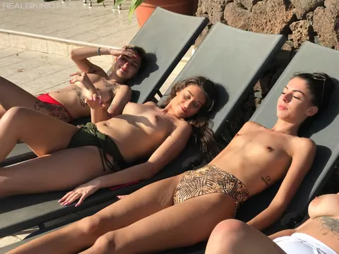 Brunette on the Beach Spreads Her Legs in a Bikini – photo 8 of 15