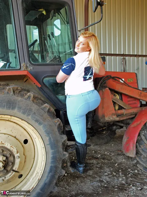 Blonde MILF Sheds Her Leather Lingerie on a Farm Tractor – photo 4 of 16