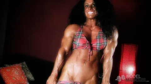 Debbie Bramwell: Ebony Bodybuilder Flexes to Show Defined Abs and Muscles – photo 17 of 21
