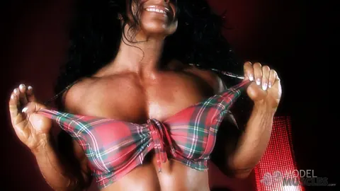 Debbie Bramwell: Ebony Bodybuilder Flexes to Show Defined Abs and Muscles – photo 13 of 21