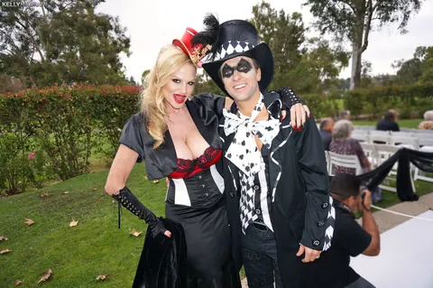 Mature Curvy Blonde Flaunts Cleavage in Halloween Costume Outdoors – photo 14 of 17