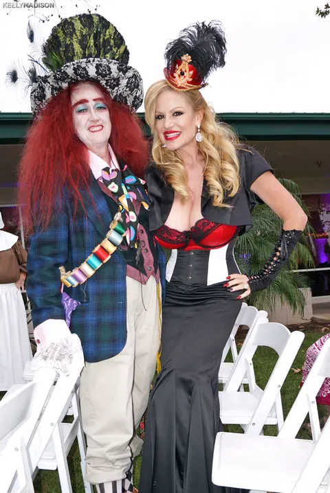 Mature Curvy Blonde Flaunts Cleavage in Halloween Costume Outdoors – photo 15 of 17