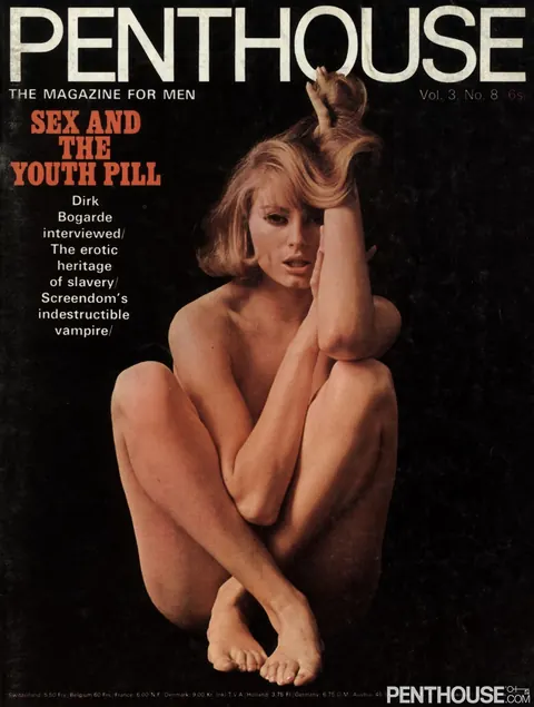 Busty Vintage Model Strips and Poses Topless – photo 17 of 21