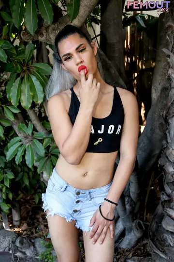 Trans Woman Strips Off Her Top and Poses Nude Showing Her Ass and Cock