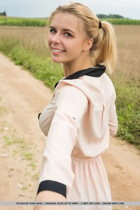 Blonde European Strips Out of Her Skirt in the Forest – photo 2 of 18