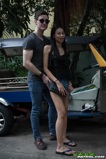 Tattooed Thai Woman Rides Cowgirl Outdoors in Shorts