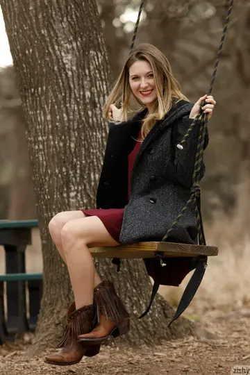 Blonde in a Skirt and Heels Spreads Outdoors