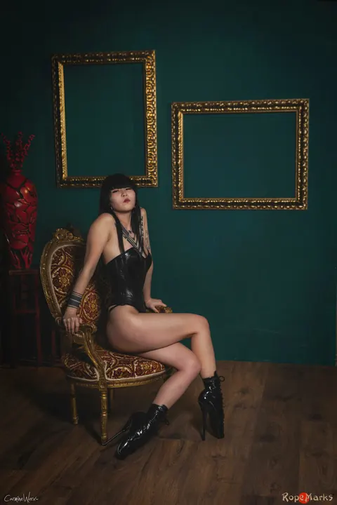 Thick Asian Brunette Flaunts Her Curves in a Leather Corset and Boots – photo 3 of 16