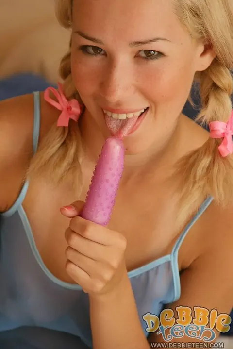 Blonde with Pigtails Plays with a Dildo – photo 9 of 15