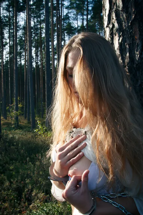 Blonde Lesbian in Bondage Plays with Hairy Pussy in the Forest – photo 9 of 21