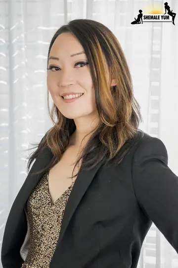 Asian Trans Woman Undresses and Poses Fully Nude with Bent Leg