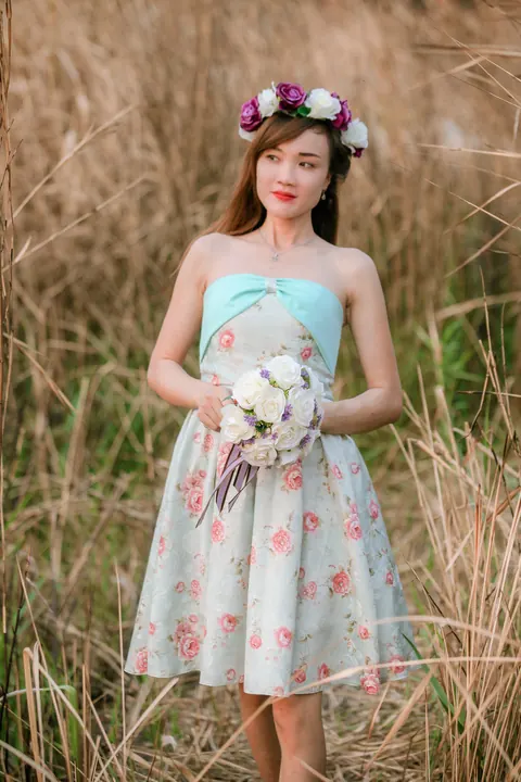 Asian Redhead Bride Lifts Her Wedding Dress Outdoors – photo 1 of 21