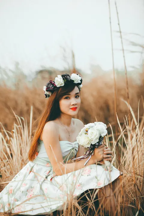 Asian Redhead Bride Lifts Her Wedding Dress Outdoors – photo 10 of 21