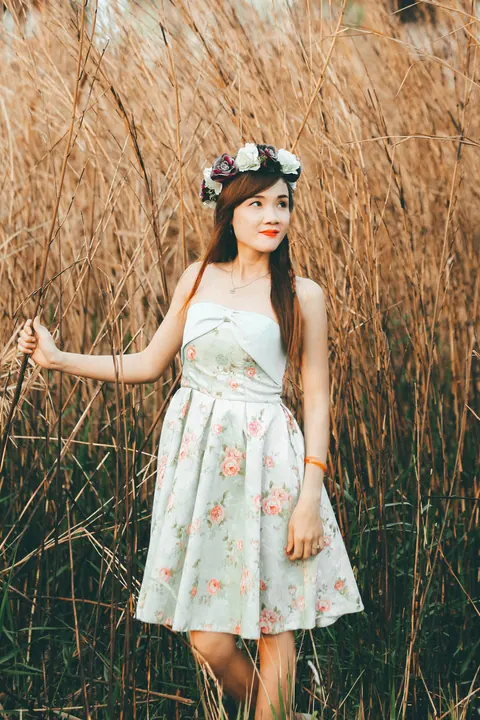 Asian Redhead Bride Lifts Her Wedding Dress Outdoors – photo 13 of 21
