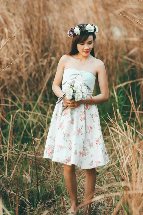 Asian Redhead Bride Lifts Her Wedding Dress Outdoors – photo 3 of 21
