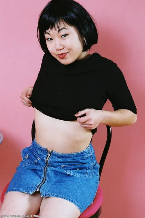 Short-Haired Asian Babe with Big Tits Strips Off Her Skirt – photo 1 of 16