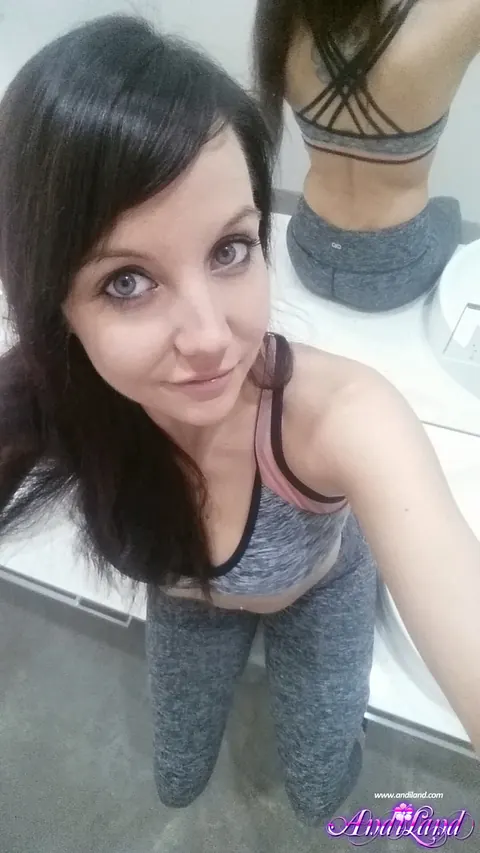 Andi Land: Brunette in Lingerie and Heels Oils Her Tits for Selfies – photo 7 of 15