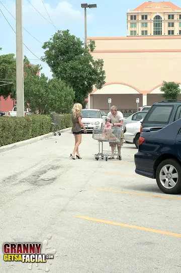 Busty Blonde MILF in Shorts and Heels Gives a Handjob Outdoors
