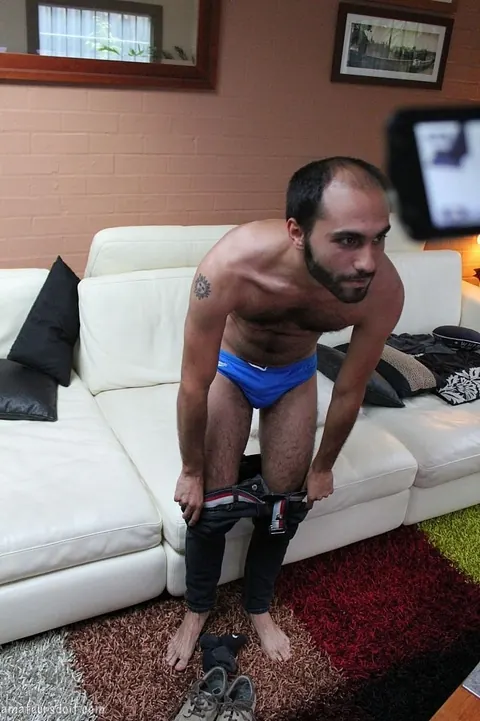 Hairy Ebony Man Strips and Masturbates on the Sofa – photo 11 of 21