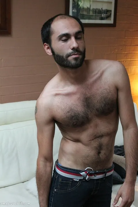 Hairy Ebony Man Strips and Masturbates on the Sofa – photo 10 of 21