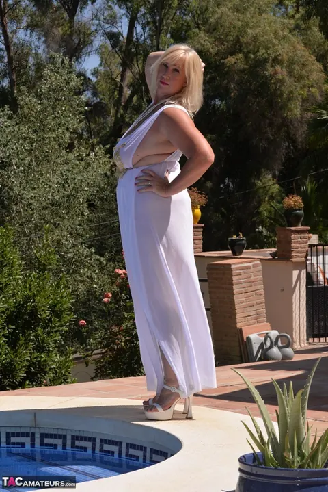 Blonde BBW in a White Dress and Heels Poses by the Pool – photo 10 of 16