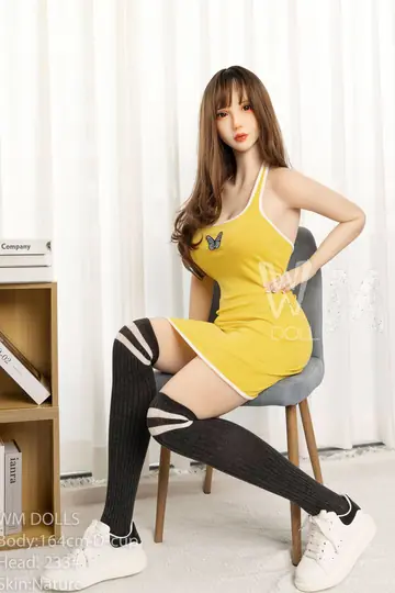 Brunette in a Dress and Stockings Lifts Hem