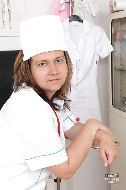 Chubby Blonde MILF Poses in a Nurse Uniform and Spreads Her Pussy – photo 2 of 16