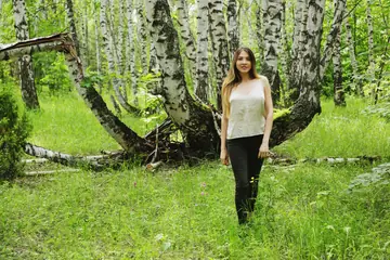 Woman in Jeans Spreads Her Shaved Pussy in the Forest