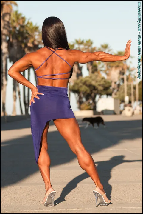 Loan Leonard: Asian Brunette in a Skirt, Shorts and Heels Poses Outdoors – photo 14 of 15
