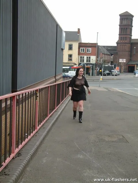 Nimue Allen: Brunette BBW in Boots and Glasses Flashes Her Big Tits Outdoors – photo 11 of 12