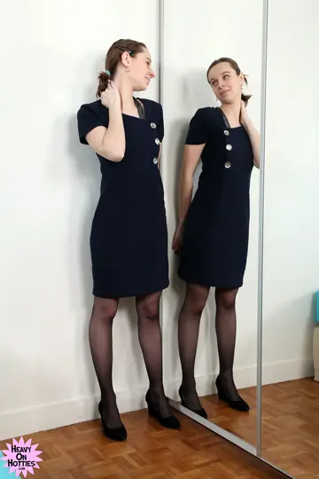 Busty Short-Haired Brunette Shows Her Hairy Pussy in Stockings and Skirt
