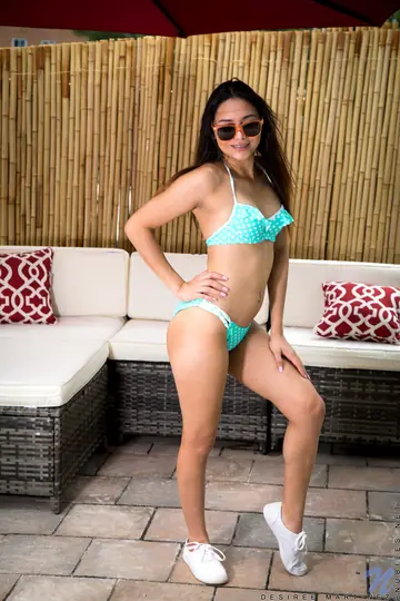 Latina in a Bikini and Glasses Fingers and Toys Her Pussy