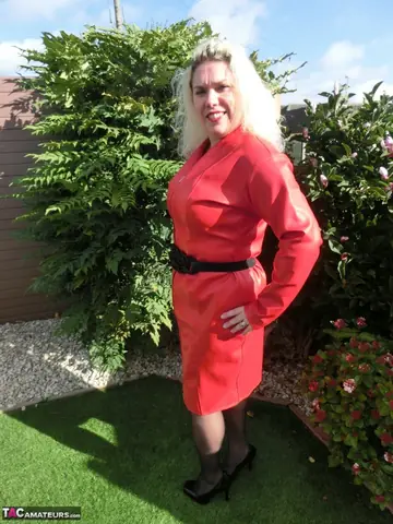 Mature Blonde MILF in Stockings Fingers Her Shaved Pussy